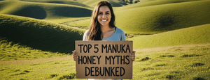 Top 5 Manuka Honey Myths debunked - woman holding a sign 